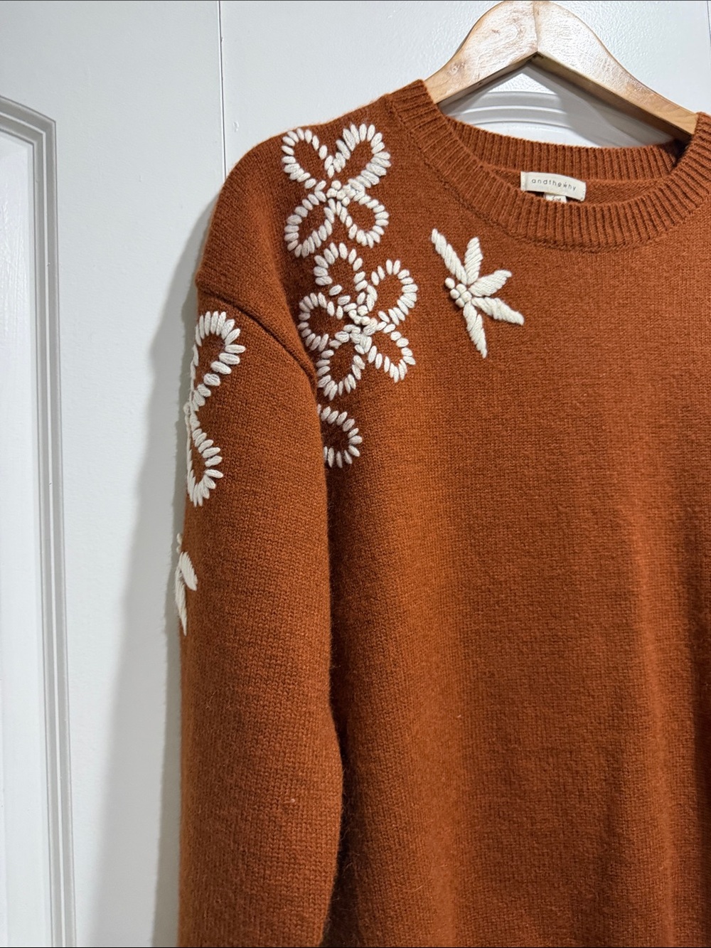 Embroidered Rust Crewneck Sweater with White Floral Detail
